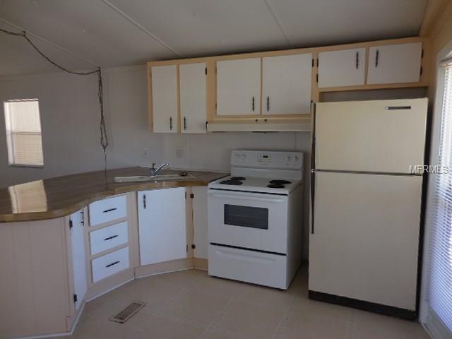 102 S TIMBER TRAIL, WILDWOOD, Florida 34785, 2 Bedrooms Bedrooms, 3 Rooms Rooms,2 BathroomsBathrooms,Residential,For sale,TIMBER,G4852592