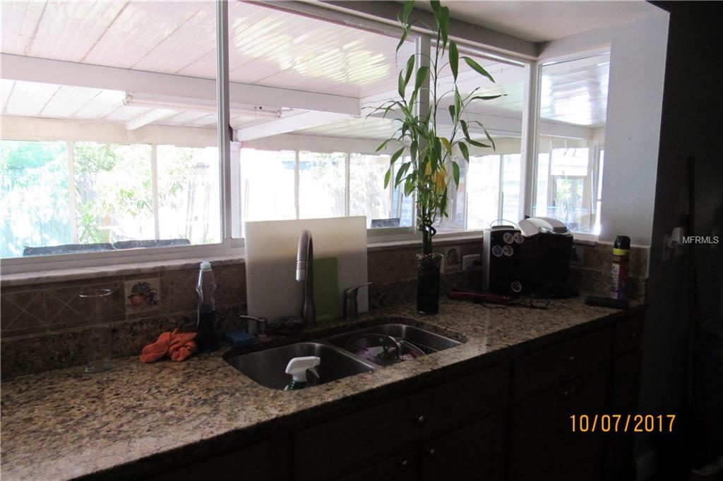 7030 OAKVIEW CIRCLE, TAMPA, Florida 33634, 4 Bedrooms Bedrooms, 6 Rooms Rooms,3 BathroomsBathrooms,Residential,For sale,OAKVIEW,U7835605