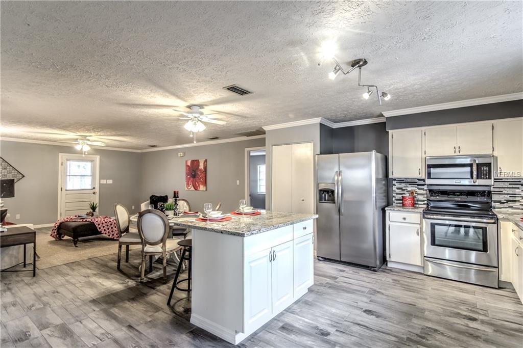 2910 W PINE STREET, TAMPA, Florida 33607, 4 Bedrooms Bedrooms, 7 Rooms Rooms,2 BathroomsBathrooms,Residential,For sale,PINE,O5553983