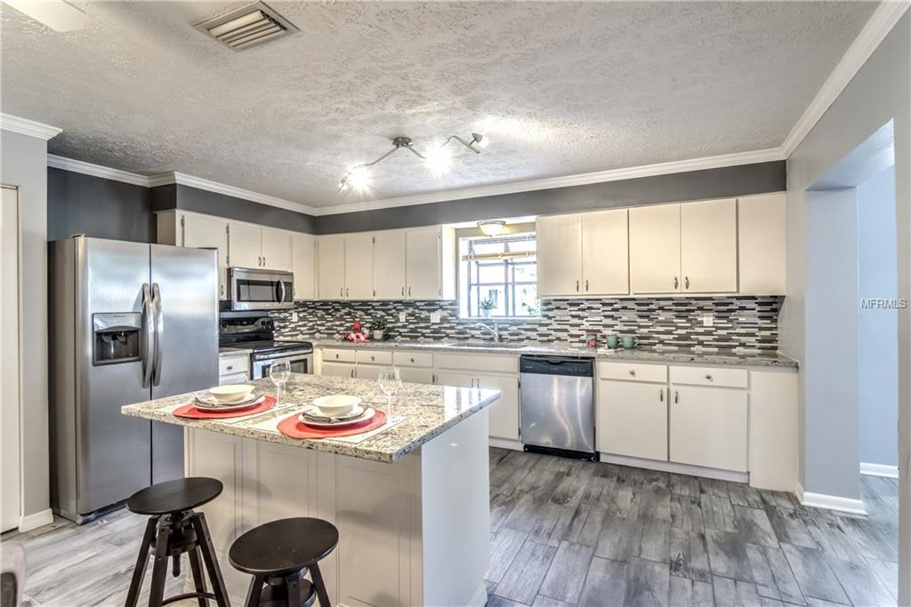 2910 W PINE STREET, TAMPA, Florida 33607, 4 Bedrooms Bedrooms, 7 Rooms Rooms,2 BathroomsBathrooms,Residential,For sale,PINE,O5553983