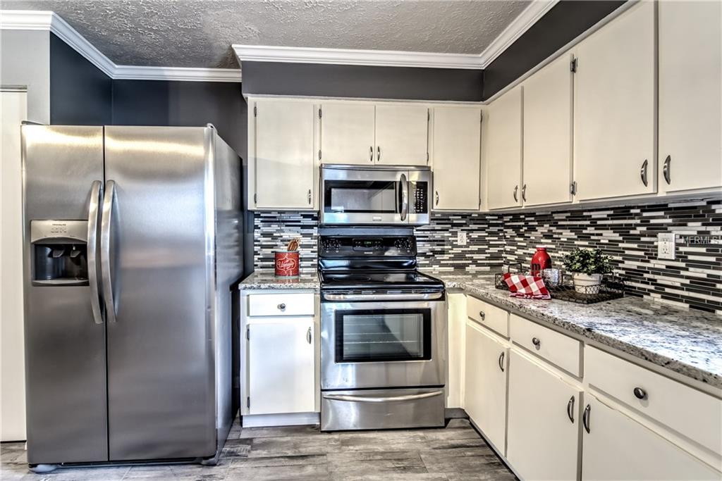 2910 W PINE STREET, TAMPA, Florida 33607, 4 Bedrooms Bedrooms, 7 Rooms Rooms,2 BathroomsBathrooms,Residential,For sale,PINE,O5553983