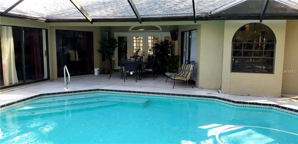 8733 WHISPERING OAKS TRAIL, NEW PORT RICHEY, Florida 34654, 4 Bedrooms Bedrooms, 8 Rooms Rooms,3 BathroomsBathrooms,Residential,For sale,WHISPERING OAKS,W7637732