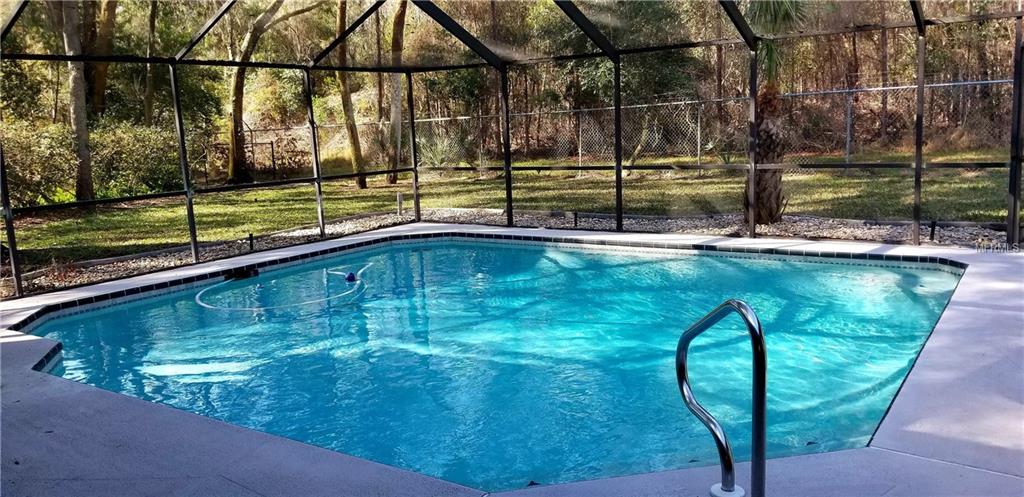 8733 WHISPERING OAKS TRAIL, NEW PORT RICHEY, Florida 34654, 4 Bedrooms Bedrooms, 8 Rooms Rooms,3 BathroomsBathrooms,Residential,For sale,WHISPERING OAKS,W7637732