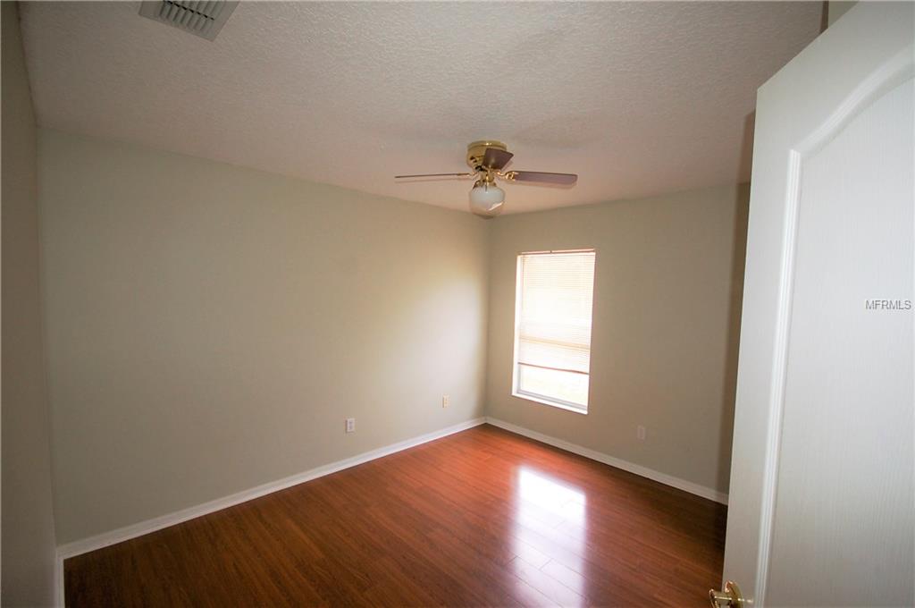 3144 FLORAL WAY E, APOPKA, Florida 32703, 4 Bedrooms Bedrooms, 9 Rooms Rooms,2 BathroomsBathrooms,Residential,For sale,FLORAL WAY E,O5559611