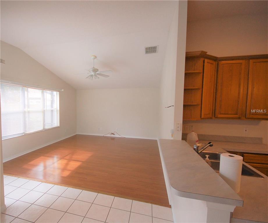 3144 FLORAL WAY E, APOPKA, Florida 32703, 4 Bedrooms Bedrooms, 9 Rooms Rooms,2 BathroomsBathrooms,Residential,For sale,FLORAL WAY E,O5559611