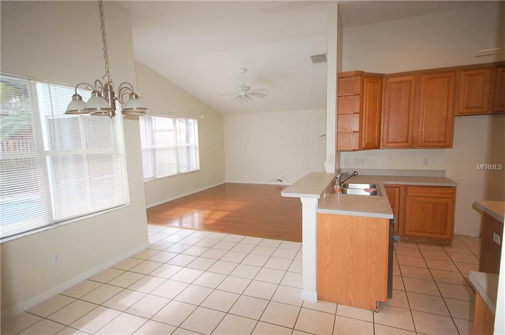 3144 FLORAL WAY E, APOPKA, Florida 32703, 4 Bedrooms Bedrooms, 9 Rooms Rooms,2 BathroomsBathrooms,Residential,For sale,FLORAL WAY E,O5559611