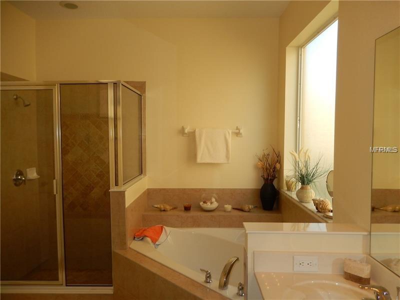 1009 ORANGE COSMOS BOULEVARD, DAVENPORT, Florida 33837, 5 Bedrooms Bedrooms, 8 Rooms Rooms,4 BathroomsBathrooms,Residential,For sale,ORANGE COSMOS,O5561627