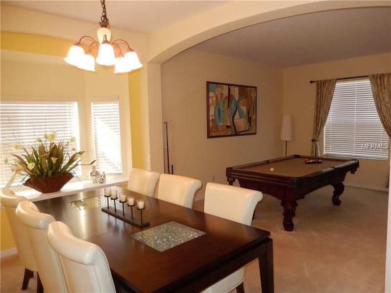 1009 ORANGE COSMOS BOULEVARD, DAVENPORT, Florida 33837, 5 Bedrooms Bedrooms, 8 Rooms Rooms,4 BathroomsBathrooms,Residential,For sale,ORANGE COSMOS,O5561627