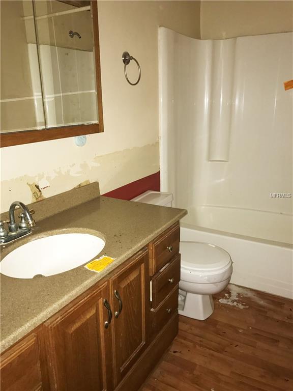 959 SUNRISE COURT, WINTER HAVEN, Florida 33880, 4 Bedrooms Bedrooms, 3 Rooms Rooms,2 BathroomsBathrooms,Residential,For sale,SUNRISE,T2899881