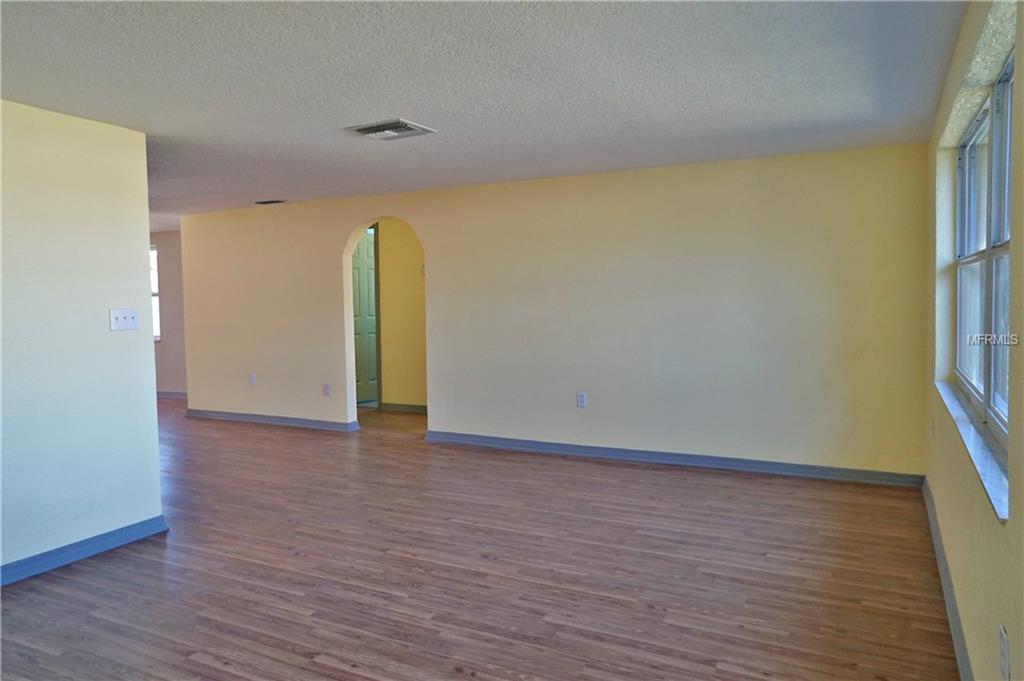 9305 MANSARD LANE, PORT RICHEY, Florida 34668, 3 Bedrooms Bedrooms, 4 Rooms Rooms,2 BathroomsBathrooms,Residential,For sale,MANSARD,U7846758