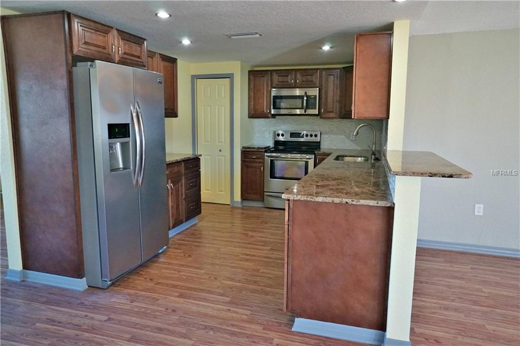 9305 MANSARD LANE, PORT RICHEY, Florida 34668, 3 Bedrooms Bedrooms, 4 Rooms Rooms,2 BathroomsBathrooms,Residential,For sale,MANSARD,U7846758