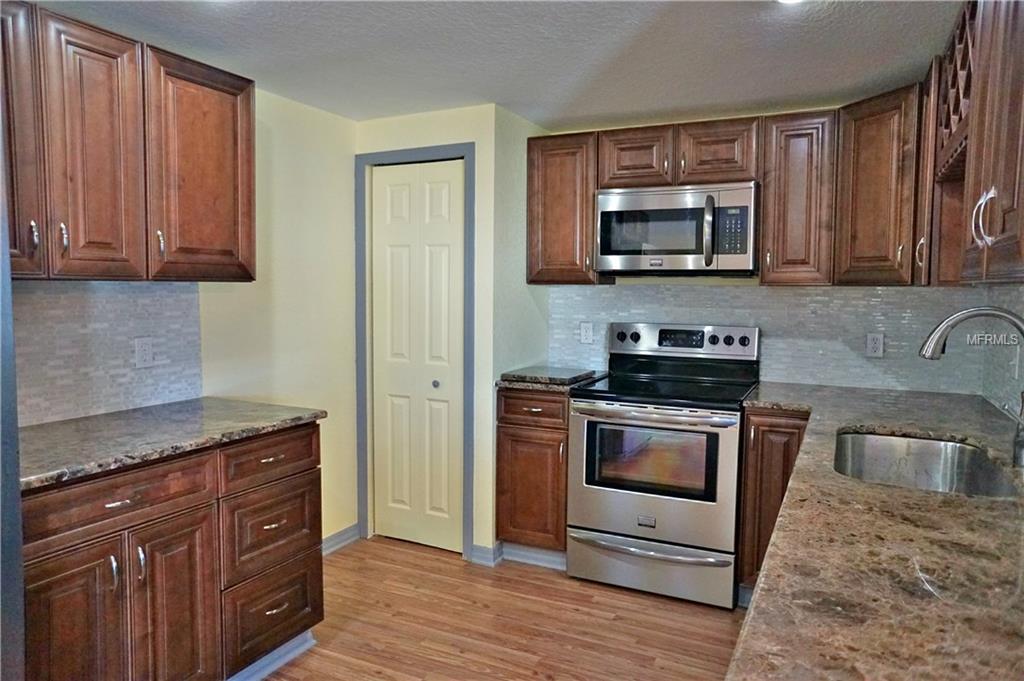 9305 MANSARD LANE, PORT RICHEY, Florida 34668, 3 Bedrooms Bedrooms, 4 Rooms Rooms,2 BathroomsBathrooms,Residential,For sale,MANSARD,U7846758