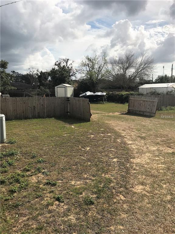 1120 DORA AVENUE, TAVARES, Florida 32778, 4 Bedrooms Bedrooms, 6 Rooms Rooms,2 BathroomsBathrooms,Residential,For sale,DORA,G4852819