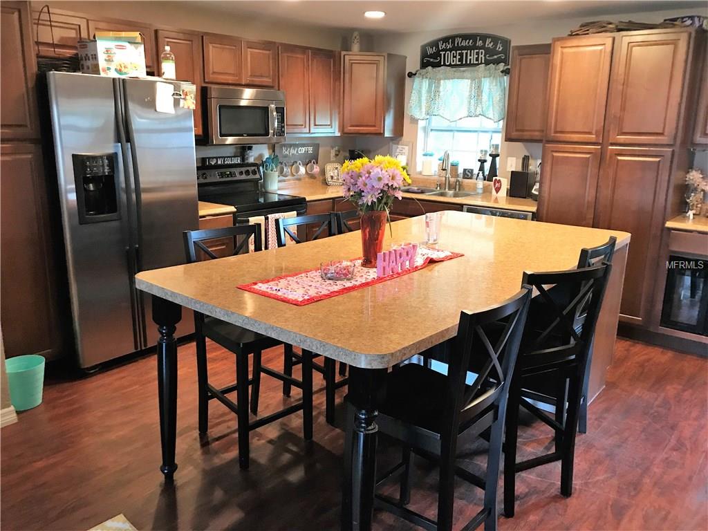 1120 DORA AVENUE, TAVARES, Florida 32778, 4 Bedrooms Bedrooms, 6 Rooms Rooms,2 BathroomsBathrooms,Residential,For sale,DORA,G4852819