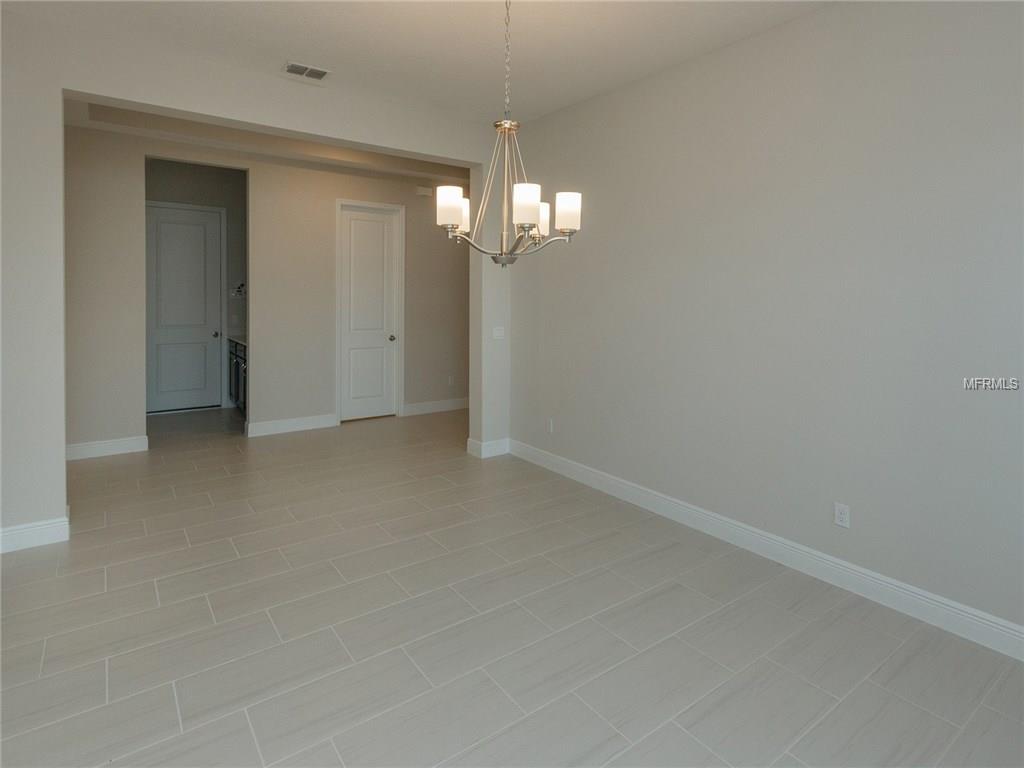 1646 HOLCOMB CREEK STREET, WINTER GARDEN, Florida 34787, 4 Bedrooms Bedrooms, 8 Rooms Rooms,3 BathroomsBathrooms,Residential,For sale,HOLCOMB CREEK,O5518335