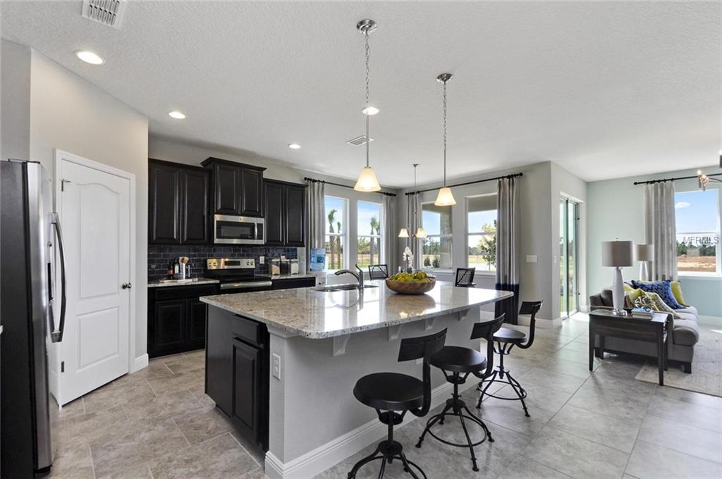 1215 GARRETT GILLIAM DRIVE, OCOEE, Florida 34761, 4 Bedrooms Bedrooms, 9 Rooms Rooms,2 BathroomsBathrooms,Residential,For sale,GARRETT GILLIAM,W7636709