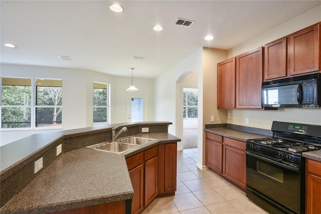 409 PARK LAKE DRIVE, DELAND, Florida 32724, 4 Bedrooms Bedrooms, 9 Rooms Rooms,2 BathroomsBathrooms,Residential,For sale,PARK LAKE,V4722430