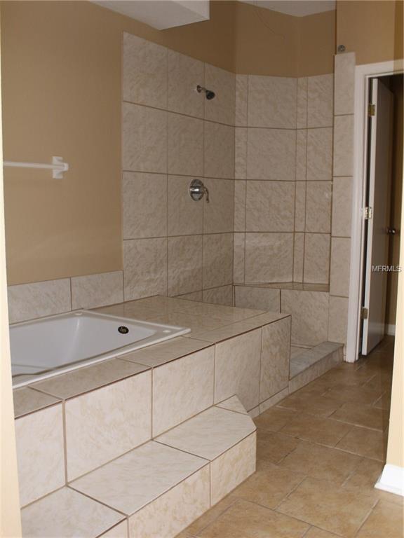 205 MANGO COURT, DAVENPORT, Florida 33897, 4 Bedrooms Bedrooms, 6 Rooms Rooms,3 BathroomsBathrooms,Residential,For sale,MANGO,O5552255