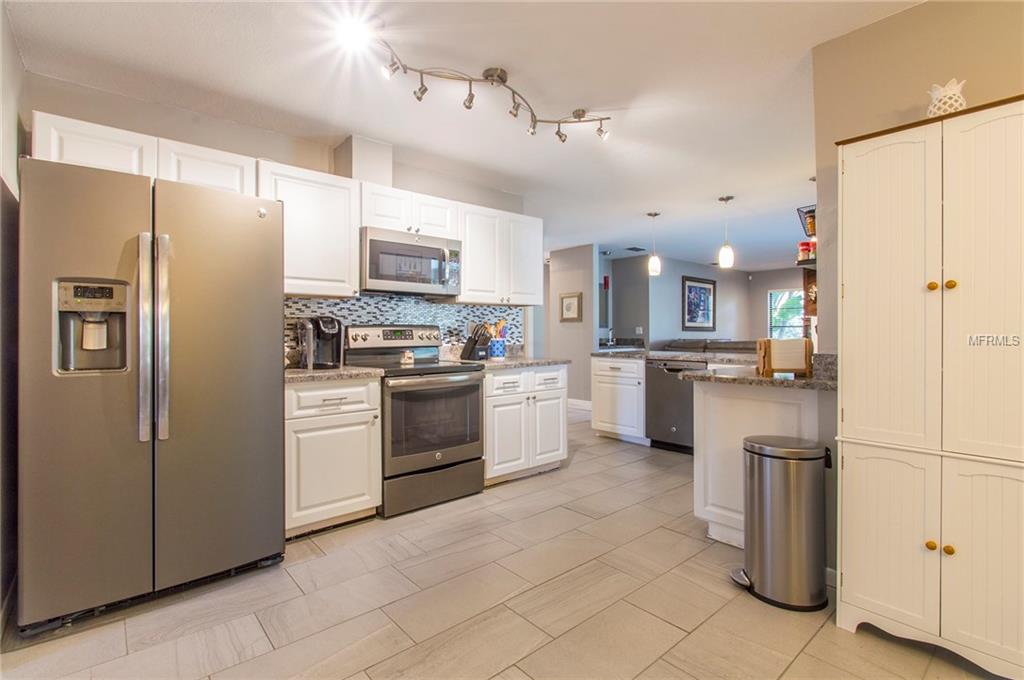 5001 BARROWE PLACE, TAMPA, Florida 33624, 4 Bedrooms Bedrooms, 7 Rooms Rooms,2 BathroomsBathrooms,Residential,For sale,BARROWE,U7842680