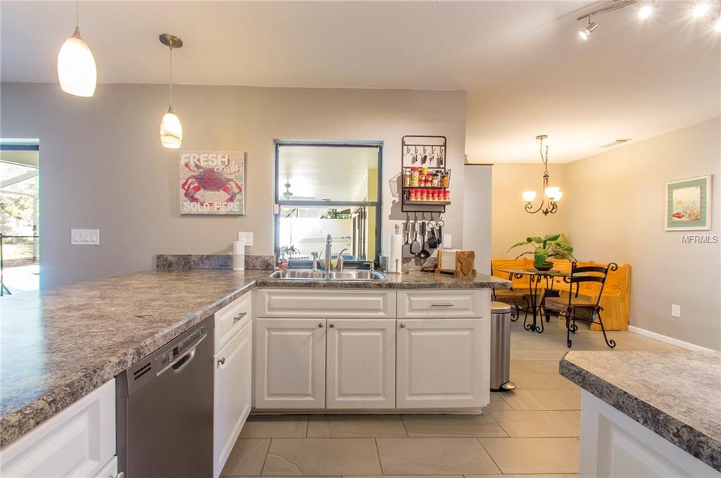 5001 BARROWE PLACE, TAMPA, Florida 33624, 4 Bedrooms Bedrooms, 7 Rooms Rooms,2 BathroomsBathrooms,Residential,For sale,BARROWE,U7842680