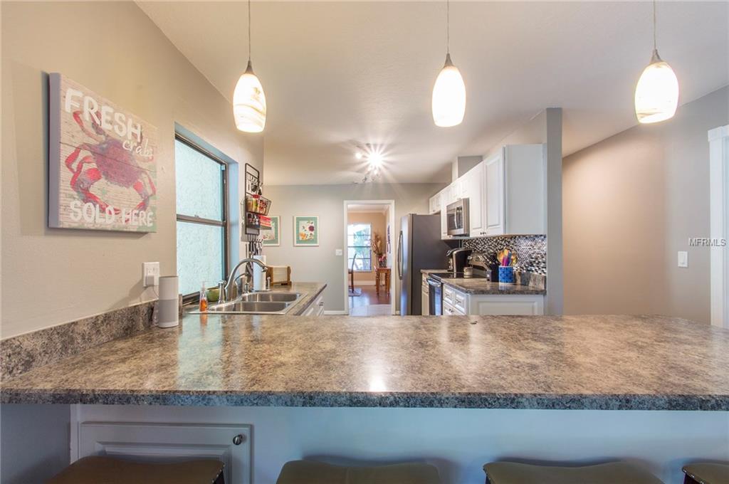 5001 BARROWE PLACE, TAMPA, Florida 33624, 4 Bedrooms Bedrooms, 7 Rooms Rooms,2 BathroomsBathrooms,Residential,For sale,BARROWE,U7842680