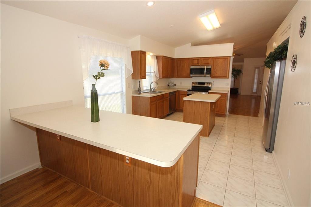 203 HAZELWOOD COURT, WINTER SPRINGS, Florida 32708, 4 Bedrooms Bedrooms, 8 Rooms Rooms,2 BathroomsBathrooms,Residential,For sale,HAZELWOOD,O5556284