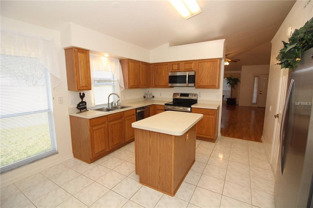 203 HAZELWOOD COURT, WINTER SPRINGS, Florida 32708, 4 Bedrooms Bedrooms, 8 Rooms Rooms,2 BathroomsBathrooms,Residential,For sale,HAZELWOOD,O5556284