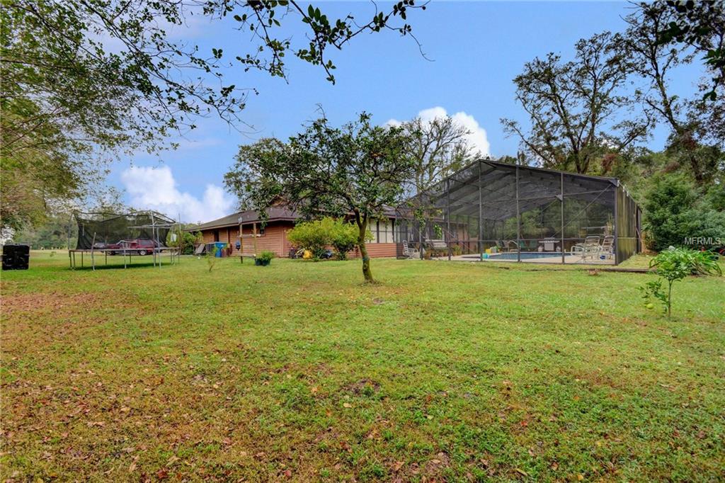 1116 HEARTWOOD DRIVE, DELAND, Florida 32720, 4 Bedrooms Bedrooms, 10 Rooms Rooms,3 BathroomsBathrooms,Residential,For sale,HEARTWOOD,V4721443