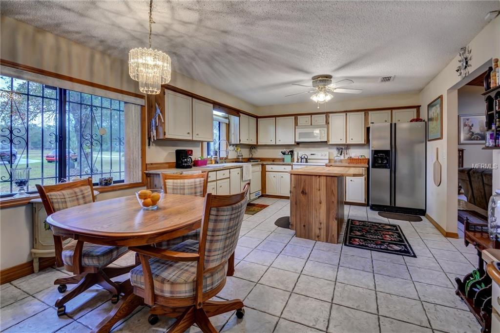 1116 HEARTWOOD DRIVE, DELAND, Florida 32720, 4 Bedrooms Bedrooms, 10 Rooms Rooms,3 BathroomsBathrooms,Residential,For sale,HEARTWOOD,V4721443