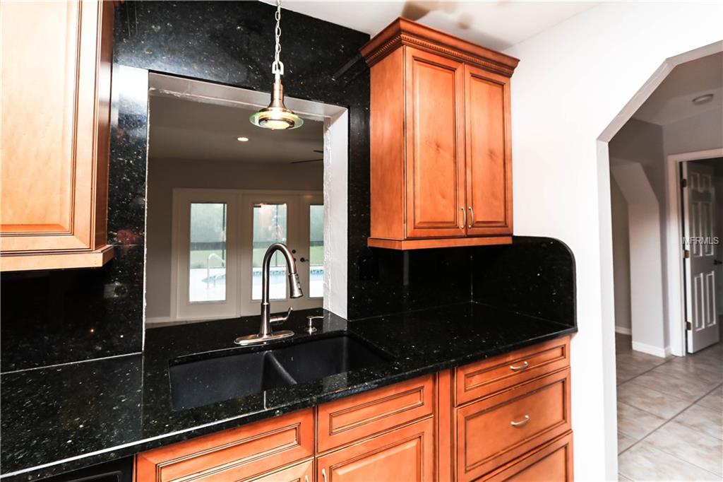 620 TRUMPET TREE, PUNTA GORDA, Florida 33955, 4 Bedrooms Bedrooms, 7 Rooms Rooms,2 BathroomsBathrooms,Residential,For sale,TRUMPET TREE,C7247266