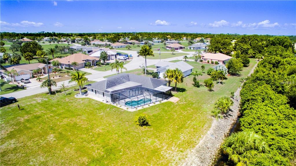 620 TRUMPET TREE, PUNTA GORDA, Florida 33955, 4 Bedrooms Bedrooms, 7 Rooms Rooms,2 BathroomsBathrooms,Residential,For sale,TRUMPET TREE,C7247266