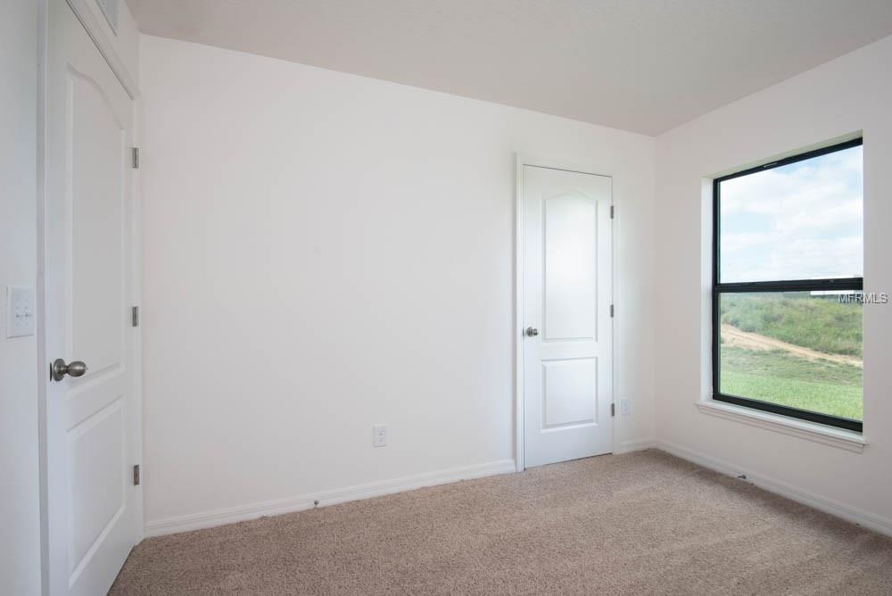 501 RIDGES DRIVE, DUNDEE, Florida 33838, 4 Bedrooms Bedrooms, 6 Rooms Rooms,2 BathroomsBathrooms,Residential,For sale,RIDGES,T2928354