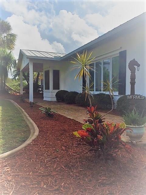 1841 BANANA STREET, PORT CHARLOTTE, Florida 33980, 3 Bedrooms Bedrooms, 7 Rooms Rooms,2 BathroomsBathrooms,Residential,For sale,BANANA,C7246432