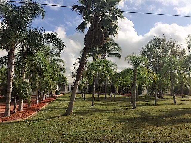 1841 BANANA STREET, PORT CHARLOTTE, Florida 33980, 3 Bedrooms Bedrooms, 7 Rooms Rooms,2 BathroomsBathrooms,Residential,For sale,BANANA,C7246432