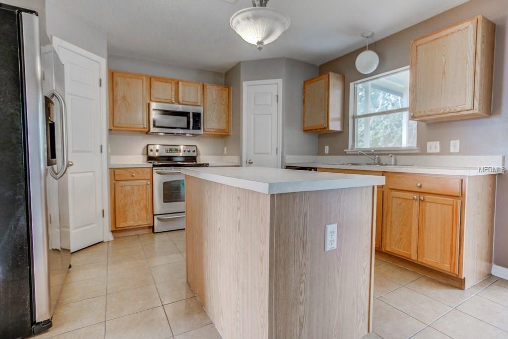 2203 AITKIN LOOP, LEESBURG, Florida 34748, 4 Bedrooms Bedrooms, 9 Rooms Rooms,2 BathroomsBathrooms,Residential,For sale,AITKIN,G4852719