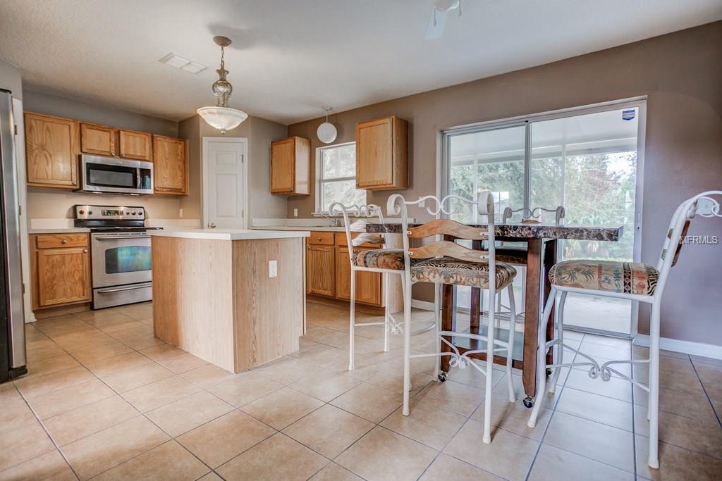 2203 AITKIN LOOP, LEESBURG, Florida 34748, 4 Bedrooms Bedrooms, 9 Rooms Rooms,2 BathroomsBathrooms,Residential,For sale,AITKIN,G4852719