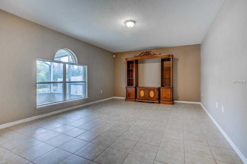 2203 AITKIN LOOP, LEESBURG, Florida 34748, 4 Bedrooms Bedrooms, 9 Rooms Rooms,2 BathroomsBathrooms,Residential,For sale,AITKIN,G4852719