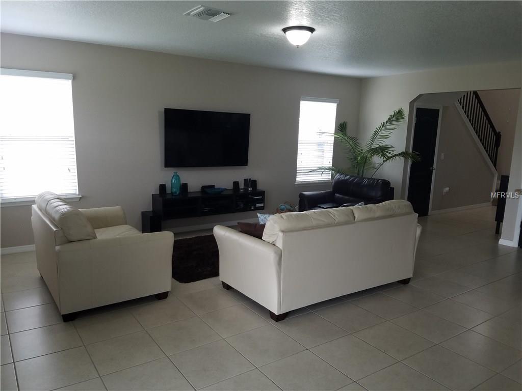 3051 PATTERSON GROVES DRIVE, HAINES CITY, Florida 33844, 4 Bedrooms Bedrooms, 6 Rooms Rooms,2 BathroomsBathrooms,Residential,For sale,PATTERSON GROVES,S4847995