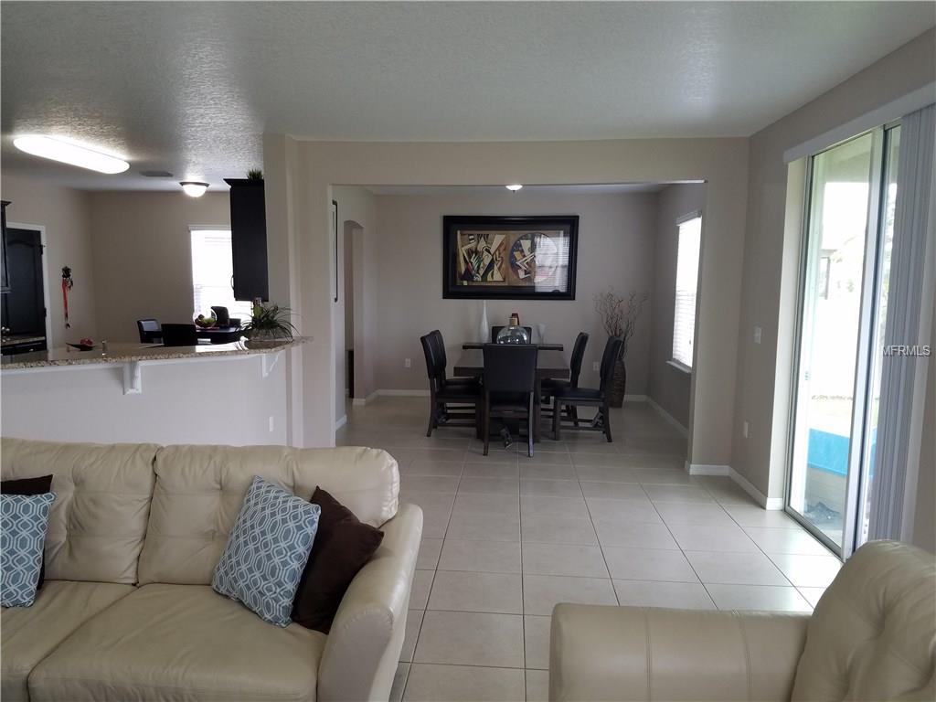 3051 PATTERSON GROVES DRIVE, HAINES CITY, Florida 33844, 4 Bedrooms Bedrooms, 6 Rooms Rooms,2 BathroomsBathrooms,Residential,For sale,PATTERSON GROVES,S4847995