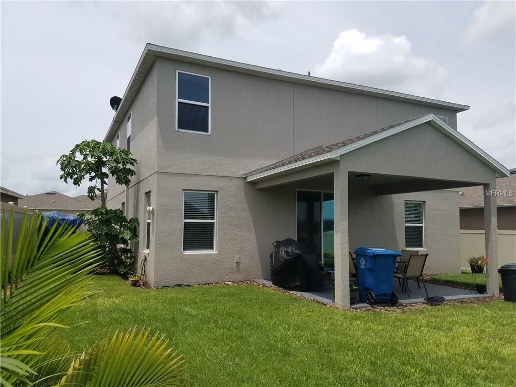 3051 PATTERSON GROVES DRIVE, HAINES CITY, Florida 33844, 4 Bedrooms Bedrooms, 6 Rooms Rooms,2 BathroomsBathrooms,Residential,For sale,PATTERSON GROVES,S4847995