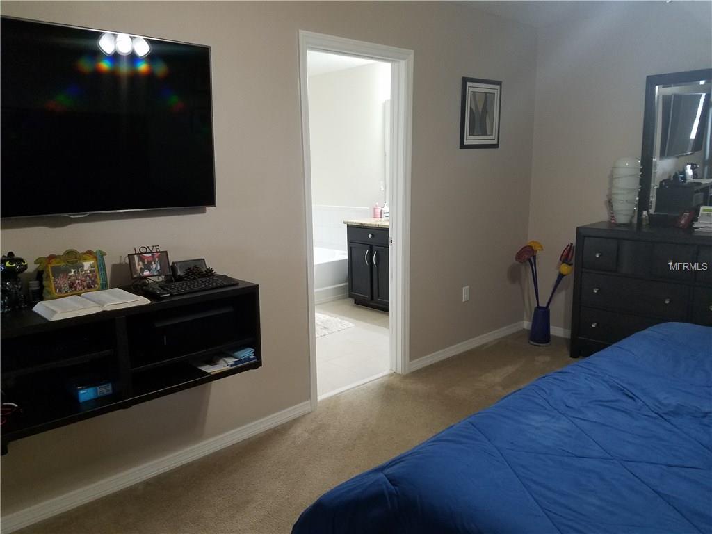 3051 PATTERSON GROVES DRIVE, HAINES CITY, Florida 33844, 4 Bedrooms Bedrooms, 6 Rooms Rooms,2 BathroomsBathrooms,Residential,For sale,PATTERSON GROVES,S4847995