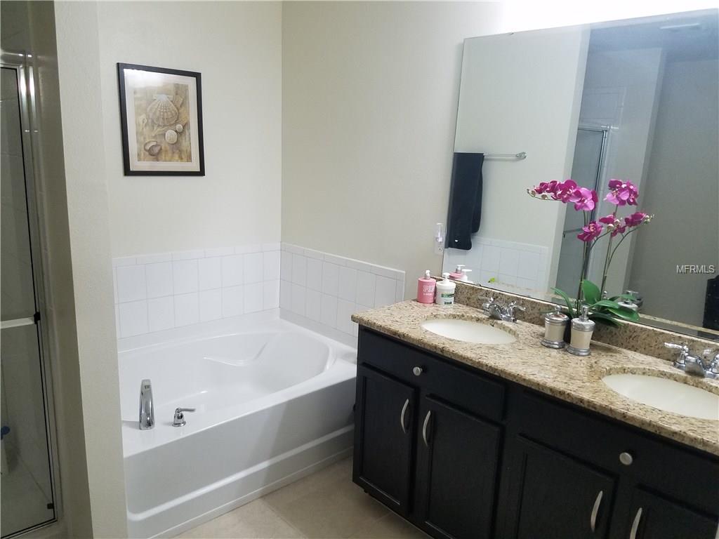 3051 PATTERSON GROVES DRIVE, HAINES CITY, Florida 33844, 4 Bedrooms Bedrooms, 6 Rooms Rooms,2 BathroomsBathrooms,Residential,For sale,PATTERSON GROVES,S4847995