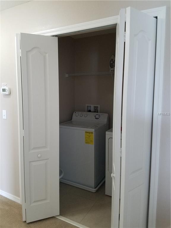 3051 PATTERSON GROVES DRIVE, HAINES CITY, Florida 33844, 4 Bedrooms Bedrooms, 6 Rooms Rooms,2 BathroomsBathrooms,Residential,For sale,PATTERSON GROVES,S4847995