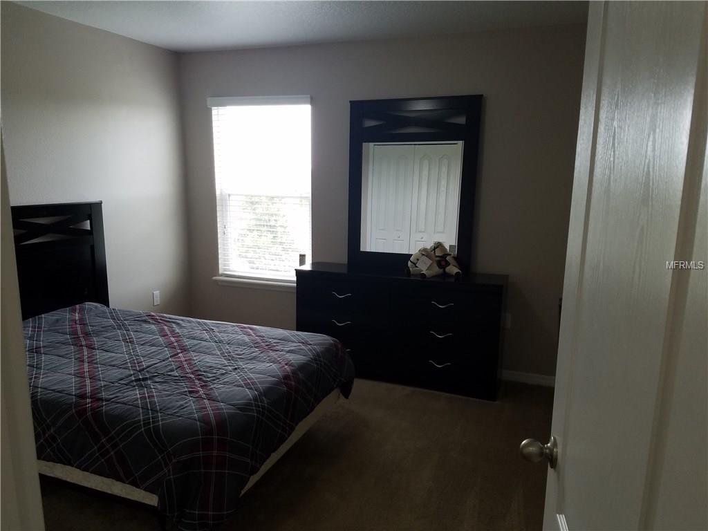 3051 PATTERSON GROVES DRIVE, HAINES CITY, Florida 33844, 4 Bedrooms Bedrooms, 6 Rooms Rooms,2 BathroomsBathrooms,Residential,For sale,PATTERSON GROVES,S4847995