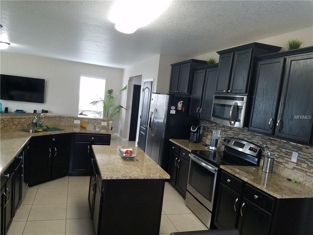 3051 PATTERSON GROVES DRIVE, HAINES CITY, Florida 33844, 4 Bedrooms Bedrooms, 6 Rooms Rooms,2 BathroomsBathrooms,Residential,For sale,PATTERSON GROVES,S4847995