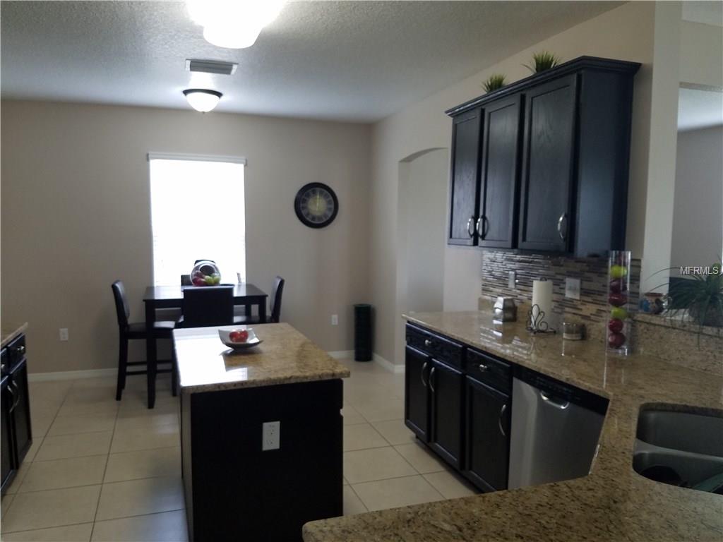 3051 PATTERSON GROVES DRIVE, HAINES CITY, Florida 33844, 4 Bedrooms Bedrooms, 6 Rooms Rooms,2 BathroomsBathrooms,Residential,For sale,PATTERSON GROVES,S4847995