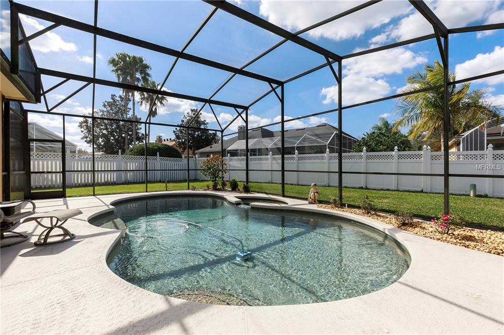 8051 BELSHIRE DRIVE, ORLANDO, Florida 32835, 4 Bedrooms Bedrooms, 10 Rooms Rooms,3 BathroomsBathrooms,Residential,For sale,BELSHIRE,O5560190