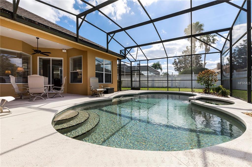 8051 BELSHIRE DRIVE, ORLANDO, Florida 32835, 4 Bedrooms Bedrooms, 10 Rooms Rooms,3 BathroomsBathrooms,Residential,For sale,BELSHIRE,O5560190