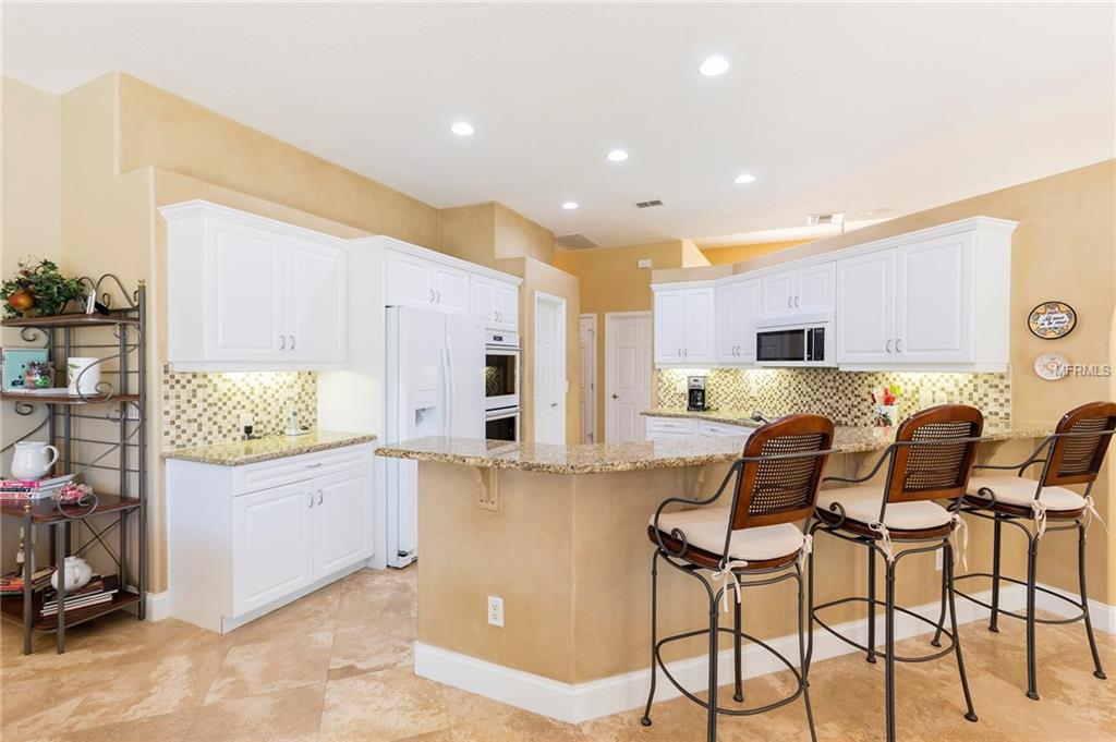 8051 BELSHIRE DRIVE, ORLANDO, Florida 32835, 4 Bedrooms Bedrooms, 10 Rooms Rooms,3 BathroomsBathrooms,Residential,For sale,BELSHIRE,O5560190