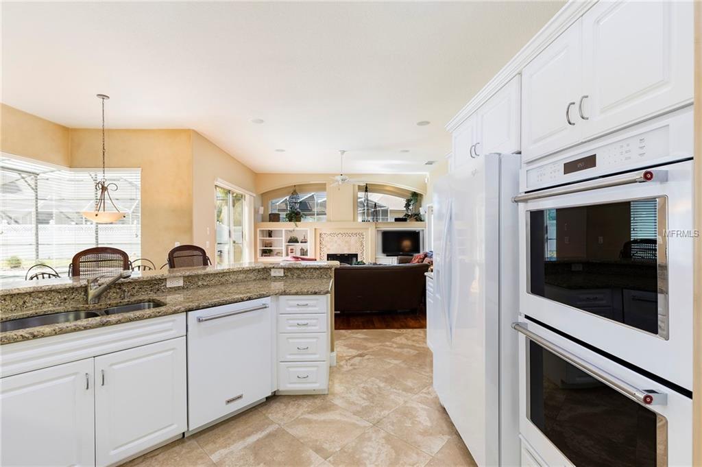 8051 BELSHIRE DRIVE, ORLANDO, Florida 32835, 4 Bedrooms Bedrooms, 10 Rooms Rooms,3 BathroomsBathrooms,Residential,For sale,BELSHIRE,O5560190